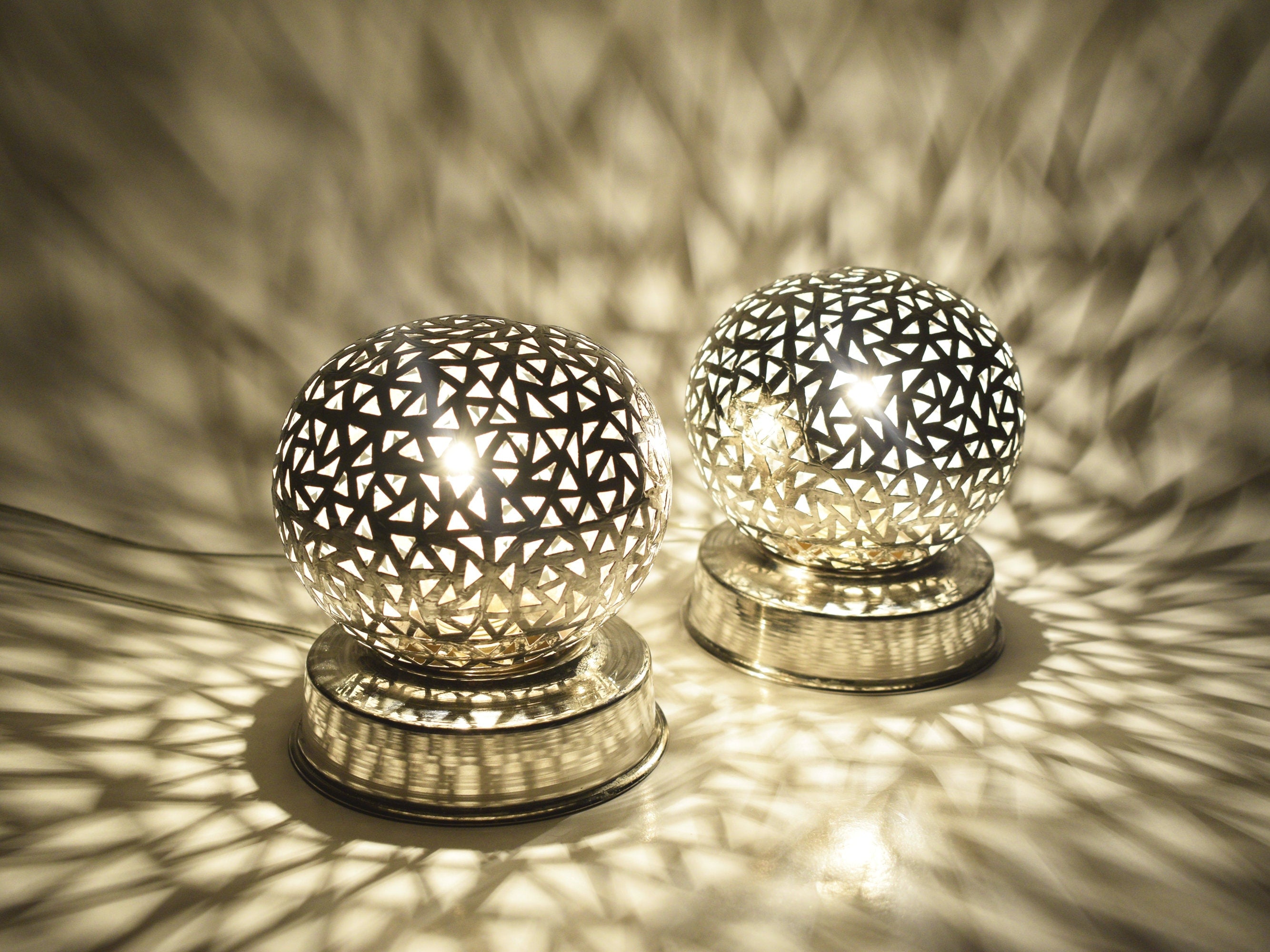 Handcrafted small Moroccan brass table lamp with geometric cutout design

