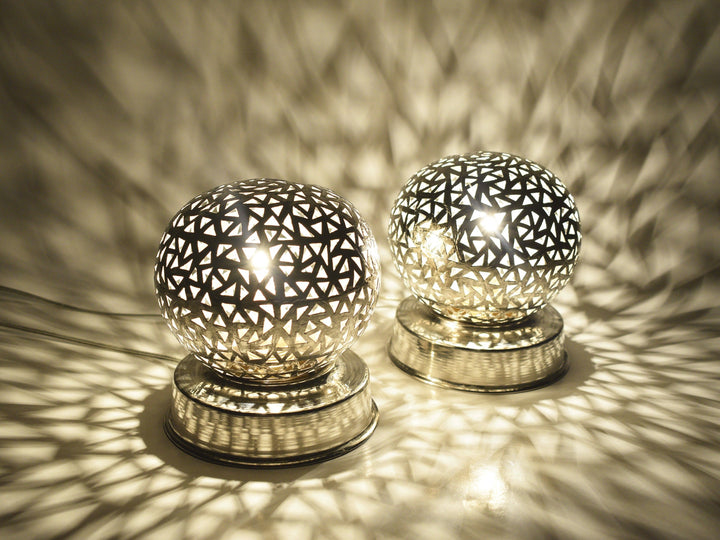 Handcrafted small Moroccan brass table lamp with geometric cutout design

