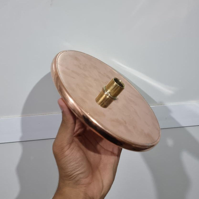 Luxurious copper rainfall shower head with wide spray for a spa-like bathroom upgrade