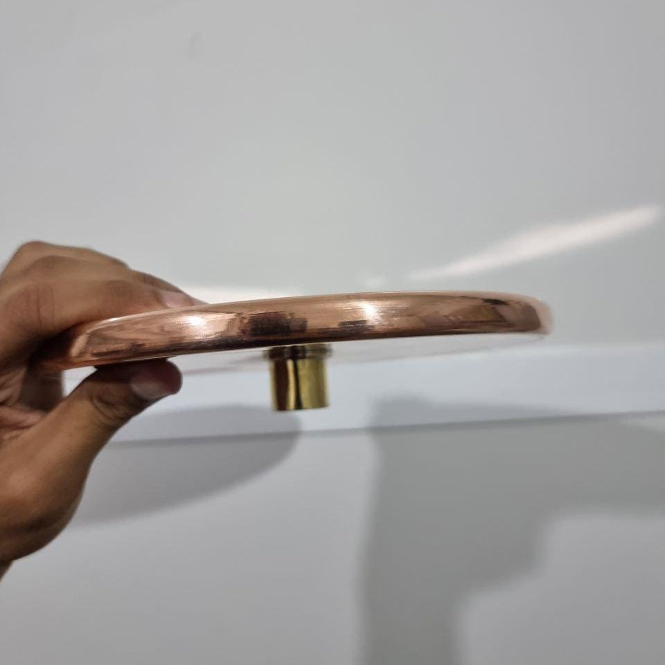 Luxurious copper rainfall shower head with wide spray for a spa-like bathroom upgrade