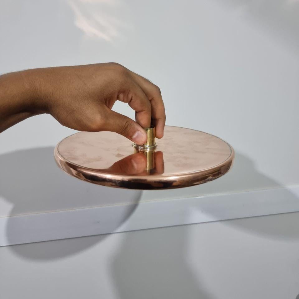 Luxurious copper rainfall shower head with wide spray for a spa-like bathroom upgrade